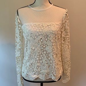 Beautiful lace top with sheer upper. By endless roses.
